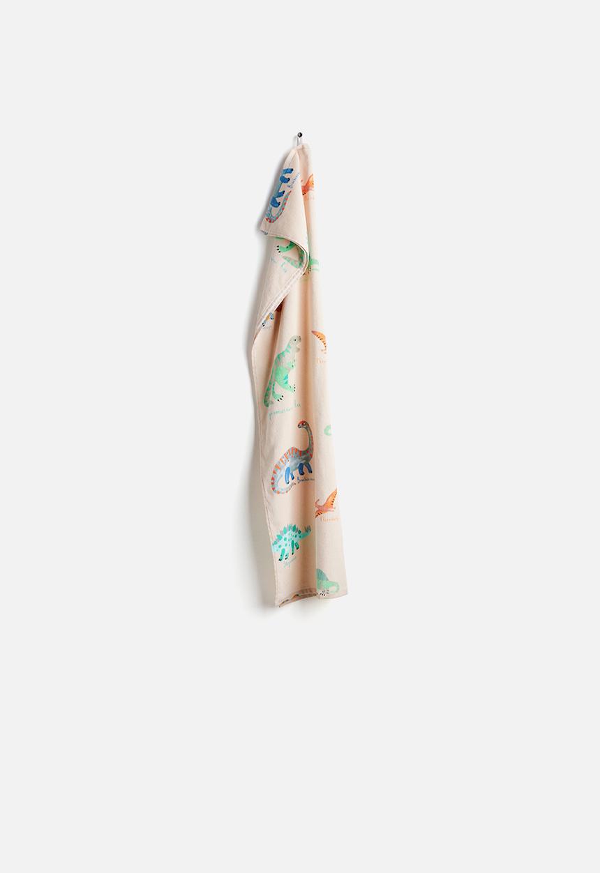 H&M - Patterned bath towel - light beige dinosaurs