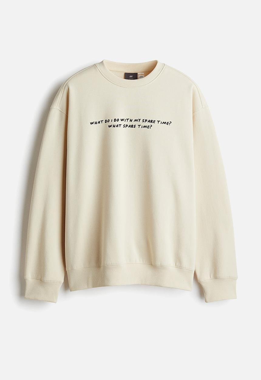 H&M - Loose fit sweatshirt - light beige keith haring