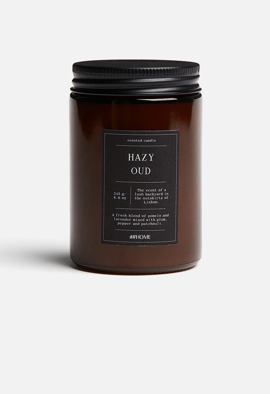 H&M - Small scented candle in glass holder - hazy oud
