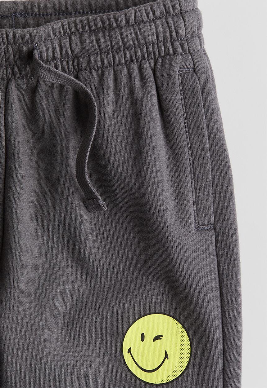 H&M - Motif-detail joggers - dark grey smileyworld®