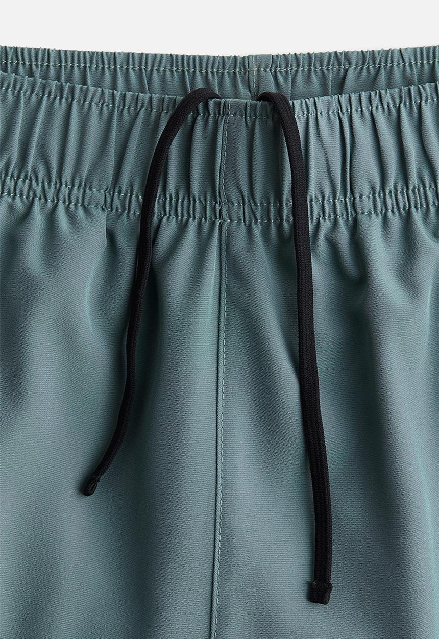 H&M - Mid-length sports shorts with drymove™ - turquoise