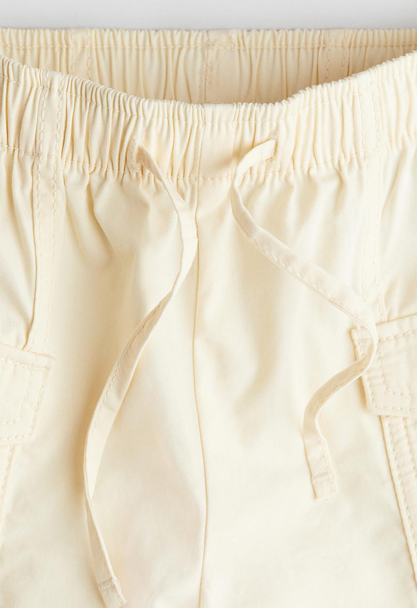 H&M - Cotton cargo trousers - light yellow 