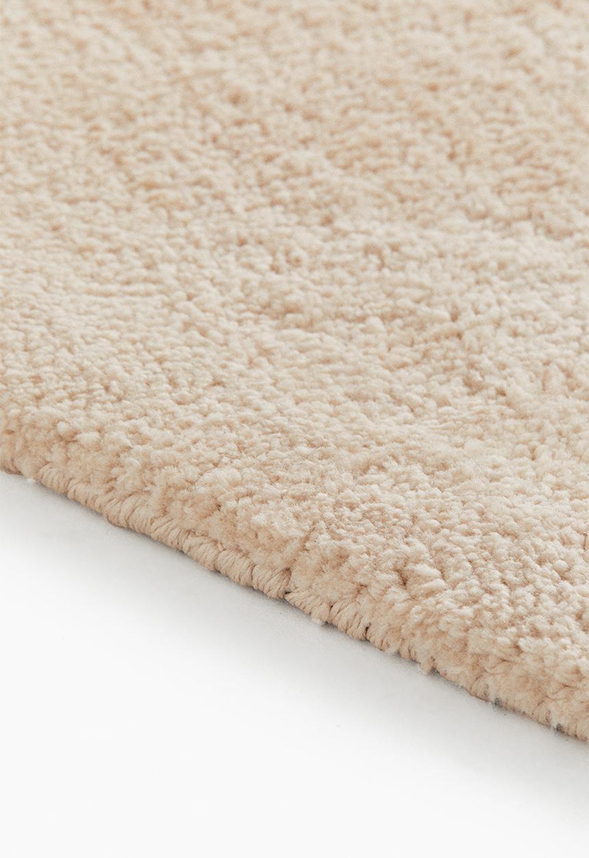 H&M - Large asymmetric rug - light beige