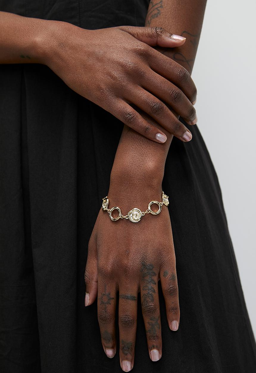 Rubi - Single bracelet- up gold swirl chain