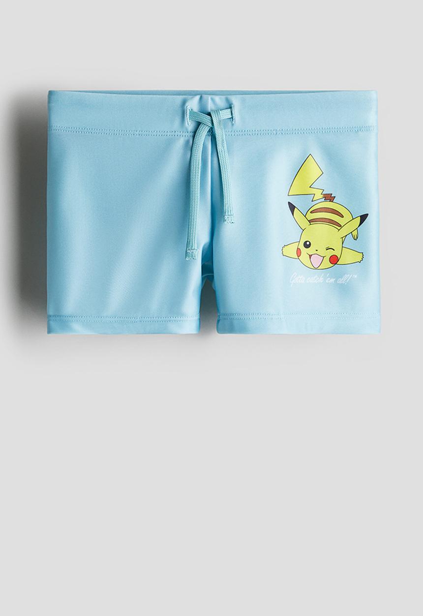 H&M - Printed swimming trunks - light blue/pokémon