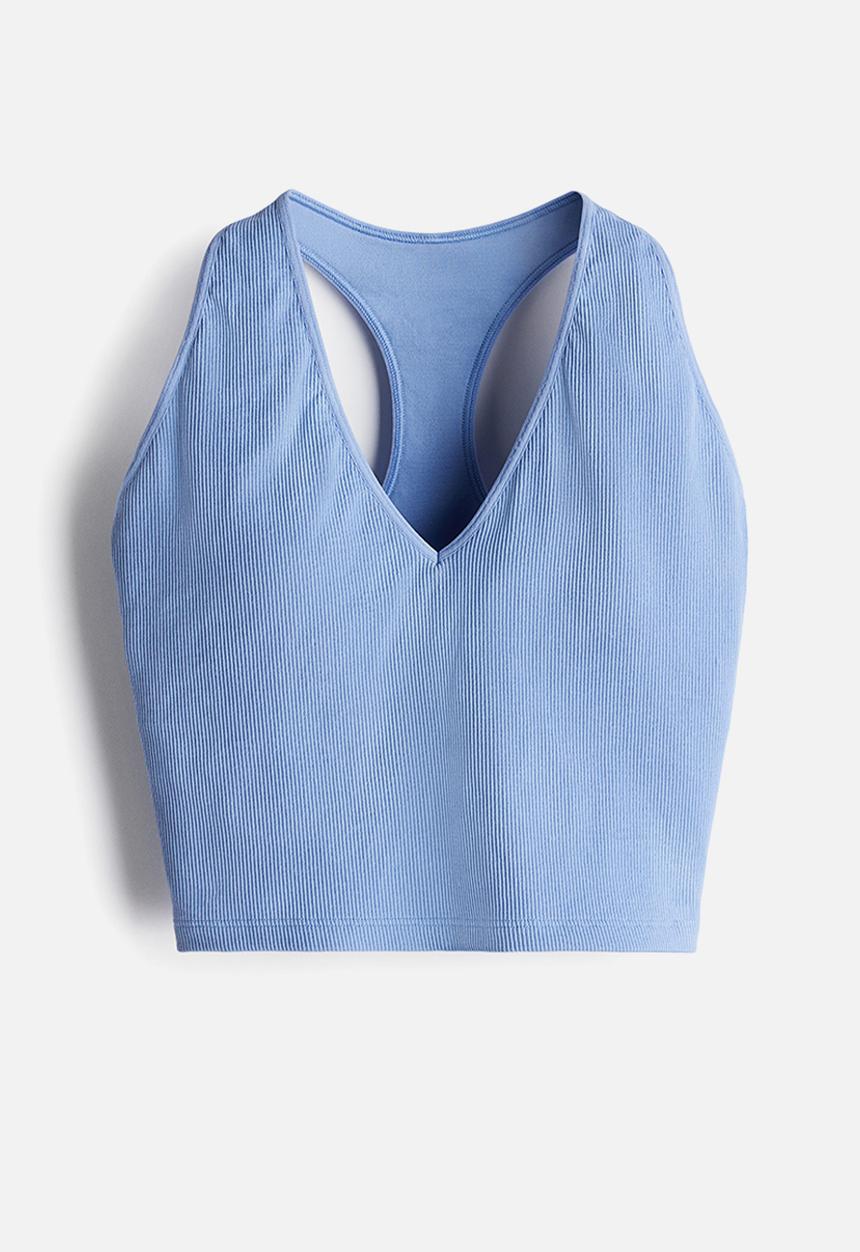 H&M - Seamless medium support sports bra with drymove™ - light blue