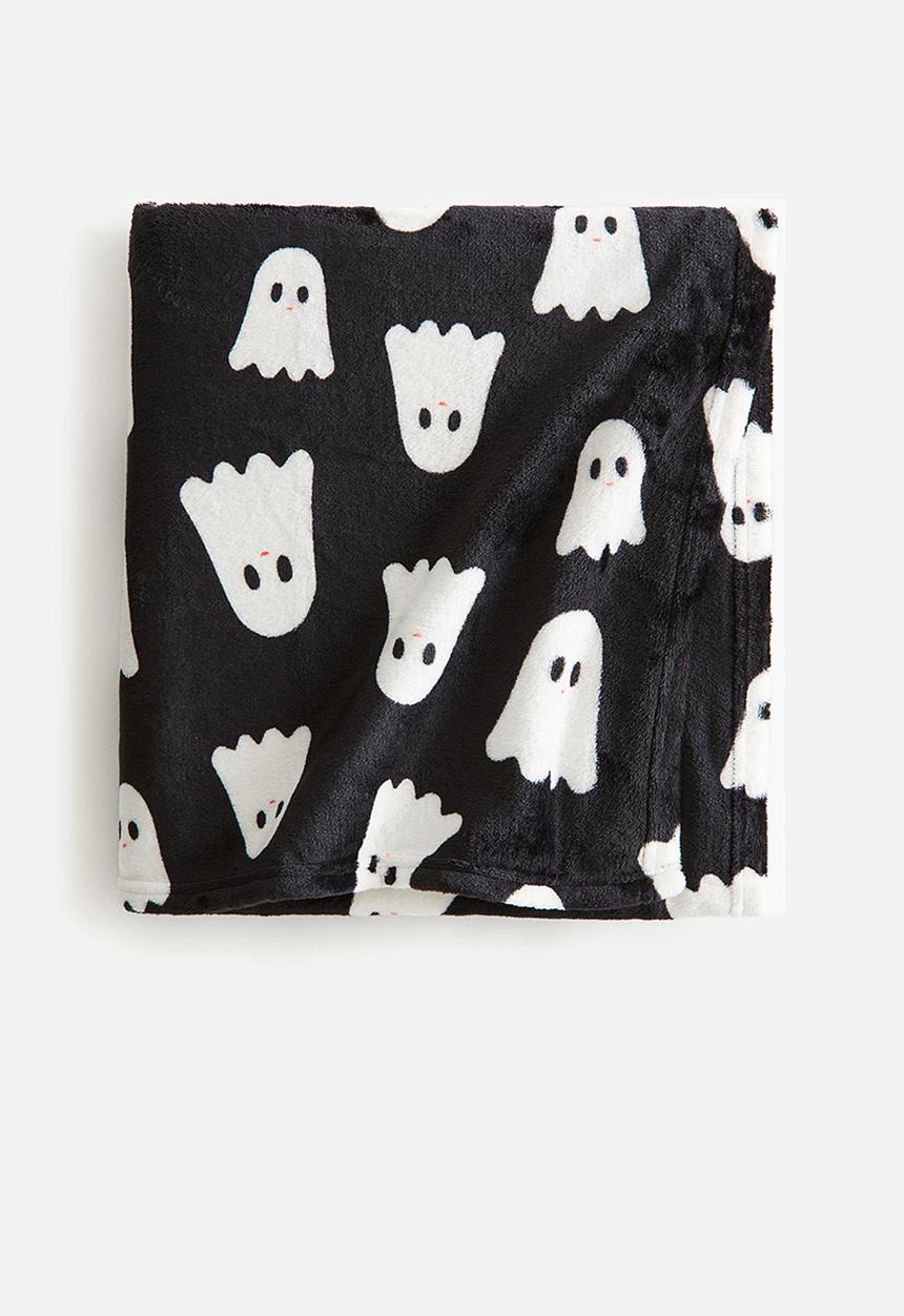H&M - Patterned fleece blanket - black ghosts