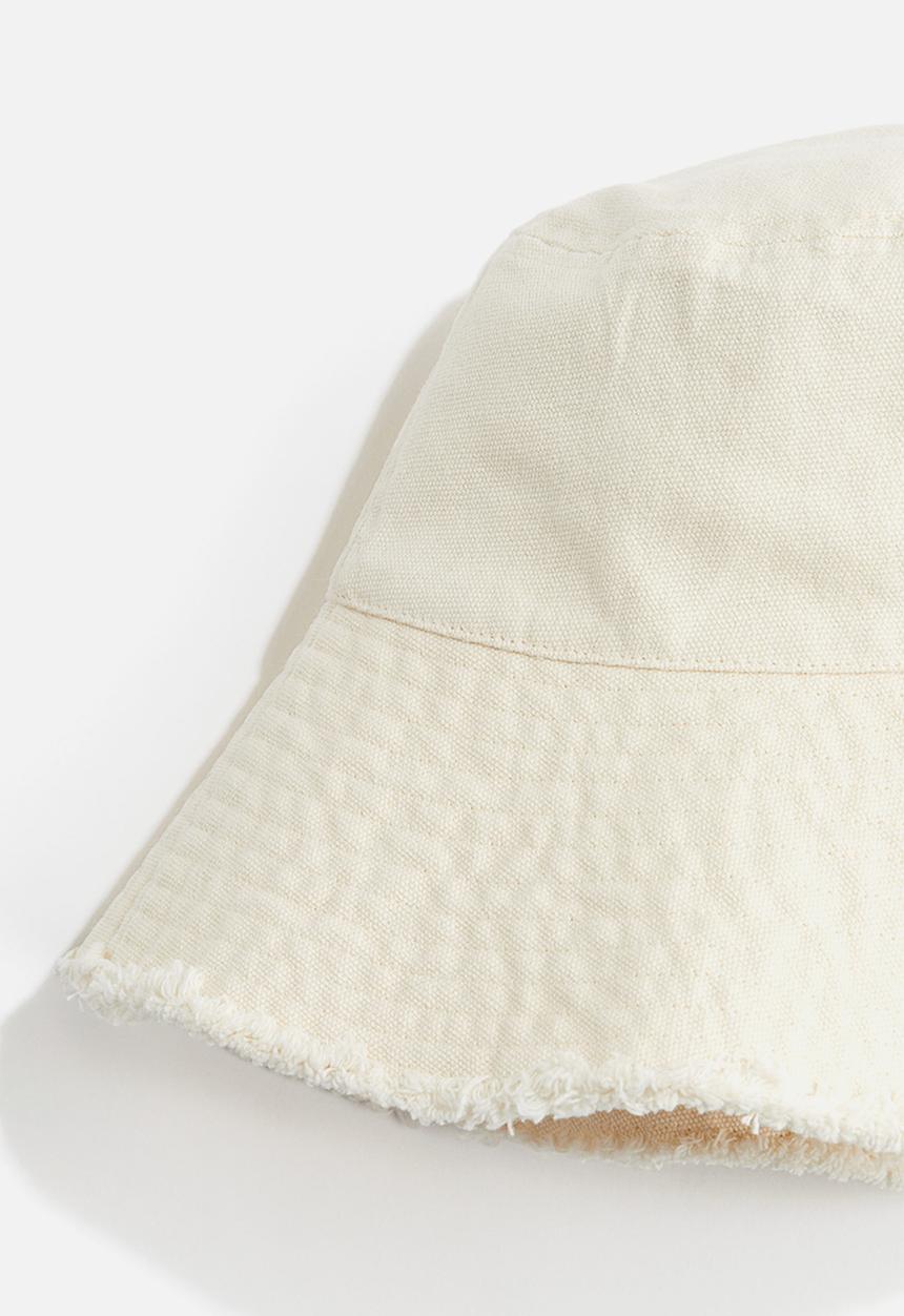 H&M - Frayed-edge denim bucket hat - cream