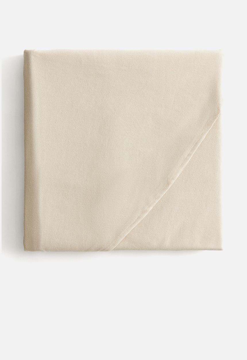 H&M - Round water-repellent tablecloth - light beige 
