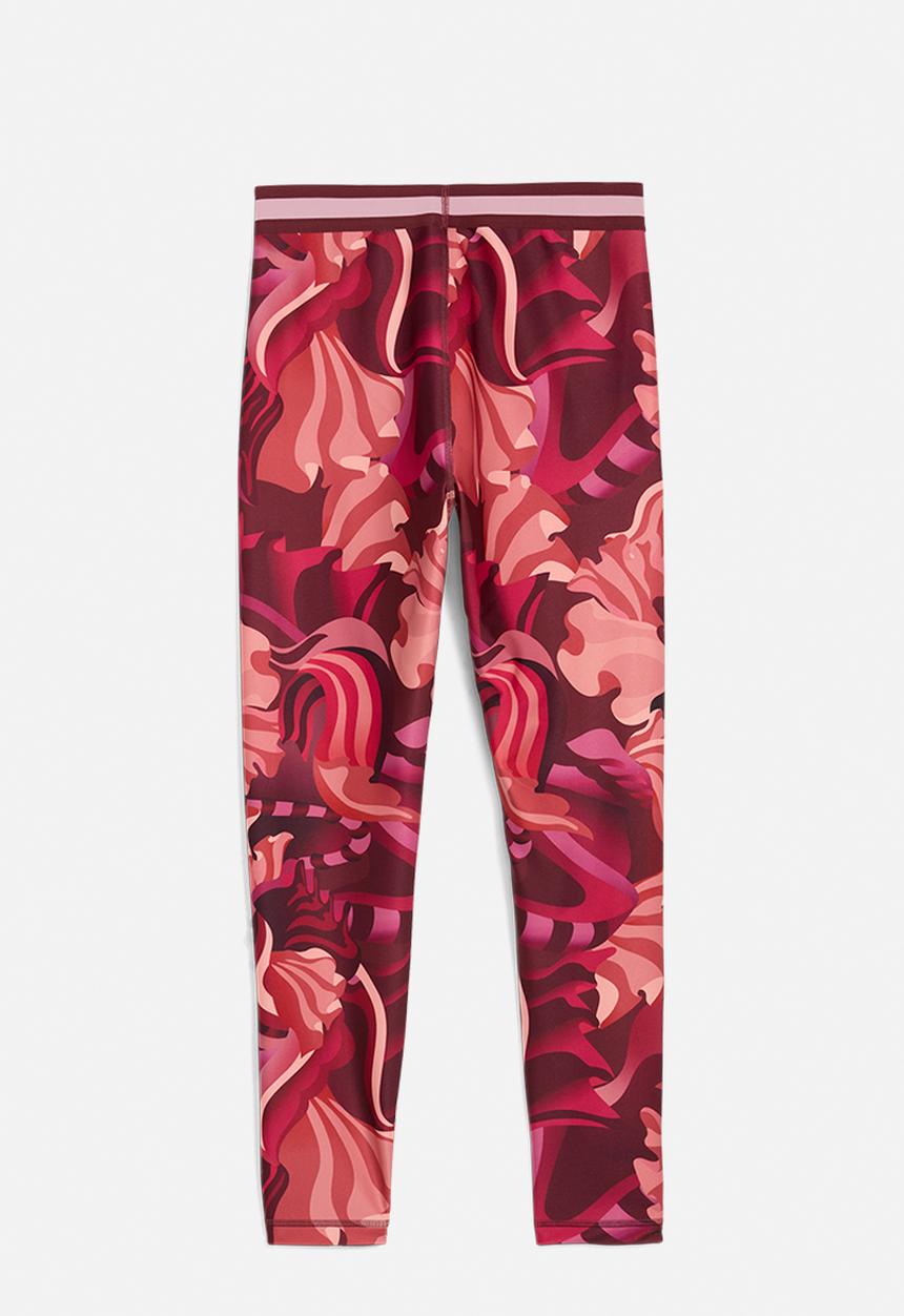 PUMA - W Puma Strong Floral Ribbon Tight - Aop Hw 7/8 - Ruby Shimmer