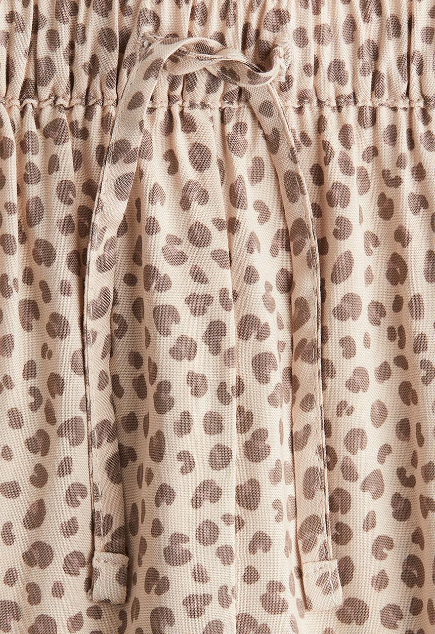 H&M - Woven joggers - light beige/leopard print