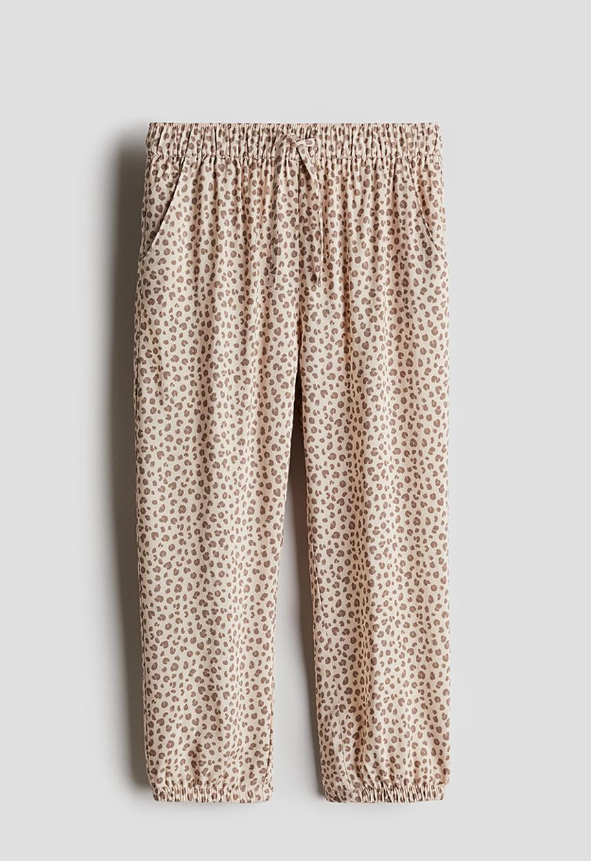 H&M - Woven joggers - light beige/leopard print
