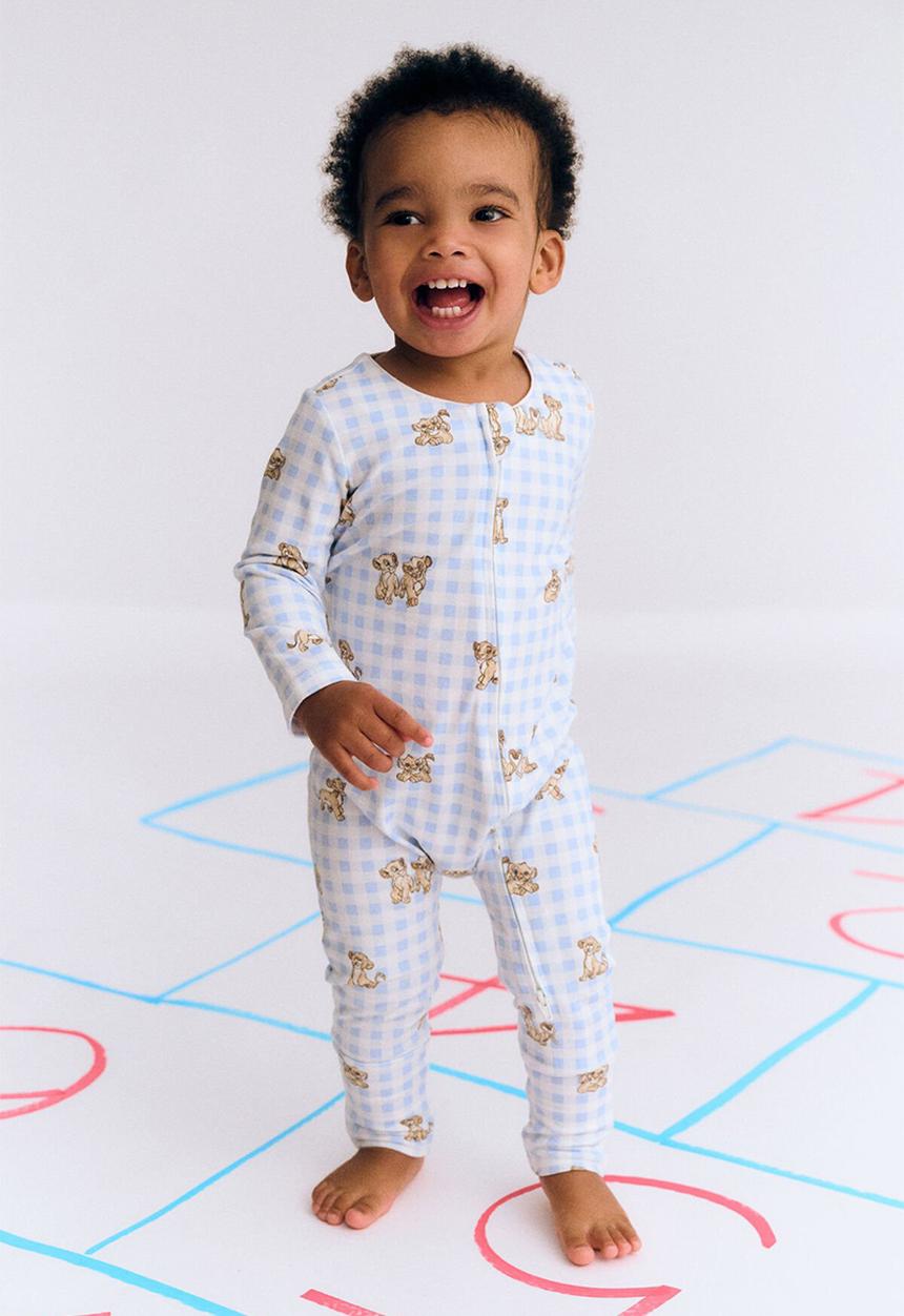 Cotton On - The long sleeve zip romper license - lcn dis dawn blue/simba & nala check