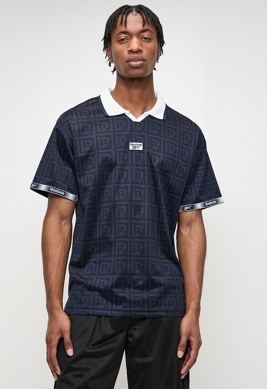Reebok - Monogram Football Polo - Vector Navy Aop