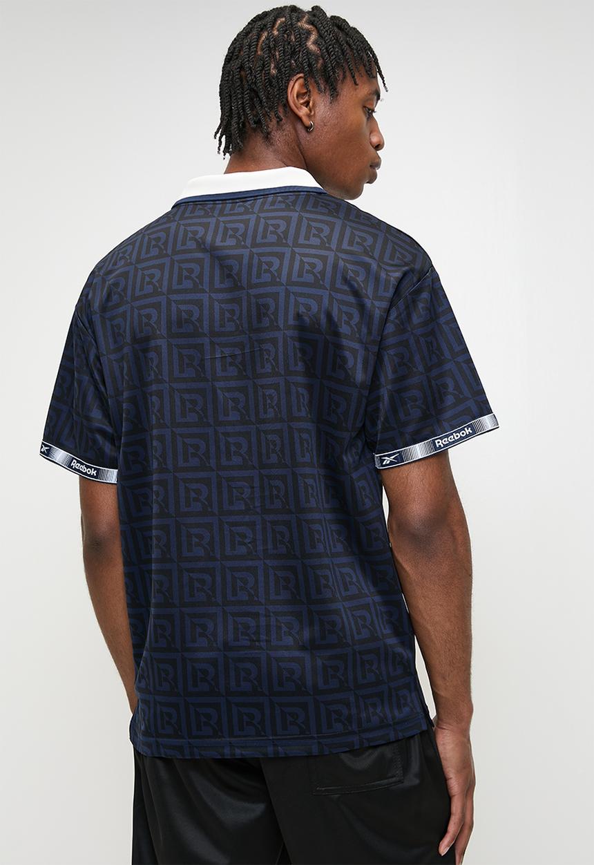 Reebok - Monogram Football Polo - Vector Navy Aop
