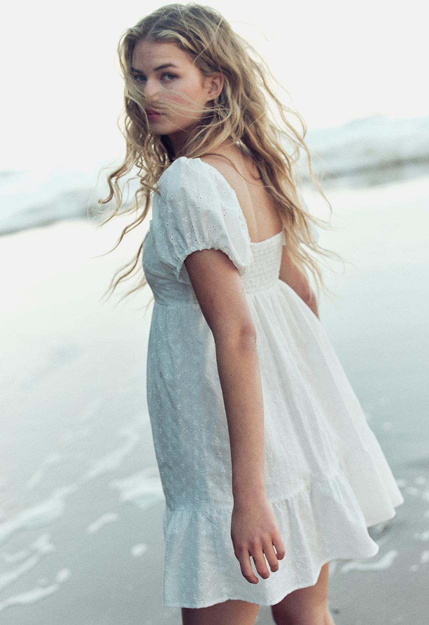 white christmas dresses Sabina Broderie Anglaise Bow-Detail A-Line Mini Dress in Ivory