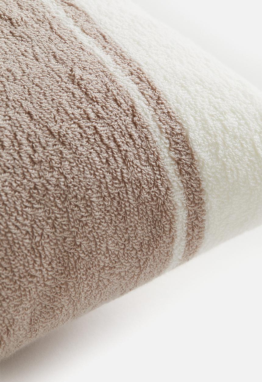 H&M - Terry beach cushion - greige block-coloured