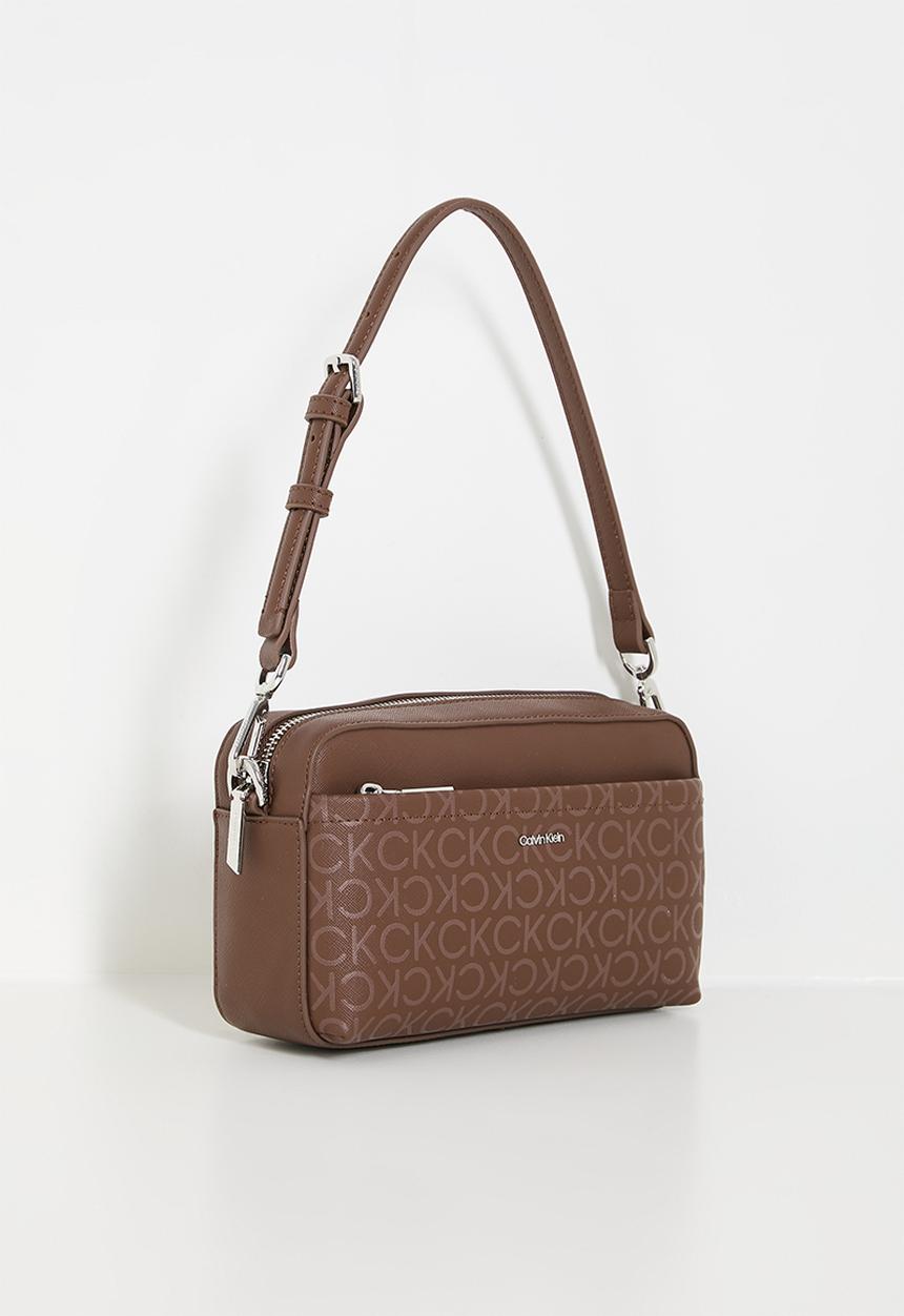 Calvin Klein - CK must convertible camera bag mono- brown