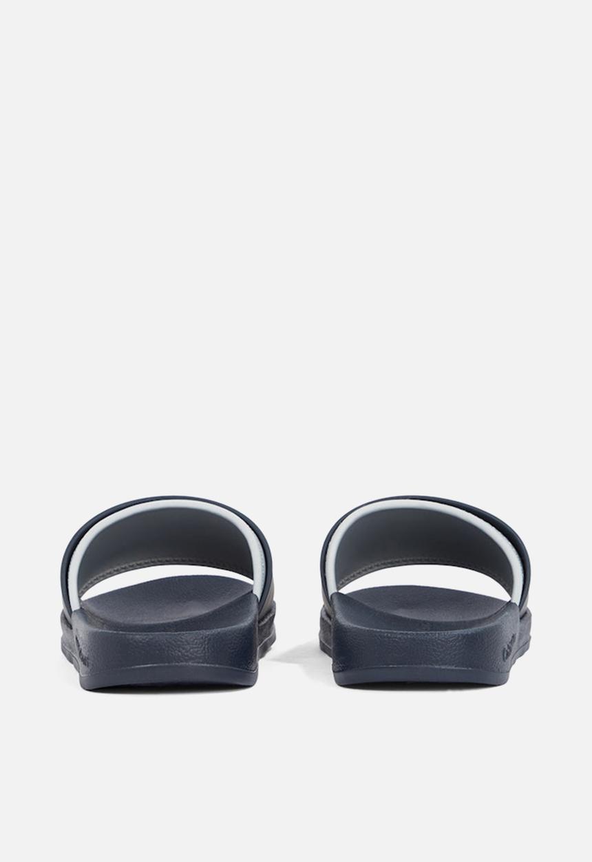 Calvin Klein - SLIDE RUBBER NEOPRENE MONOLOGO - Blue