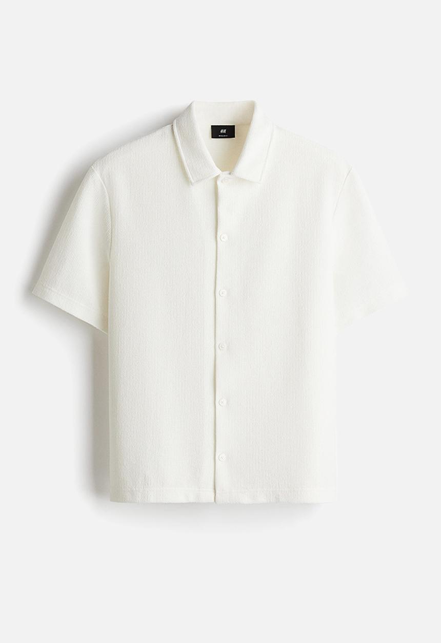 H&M - Regular fit short-sleeved jersey shirt - cream
