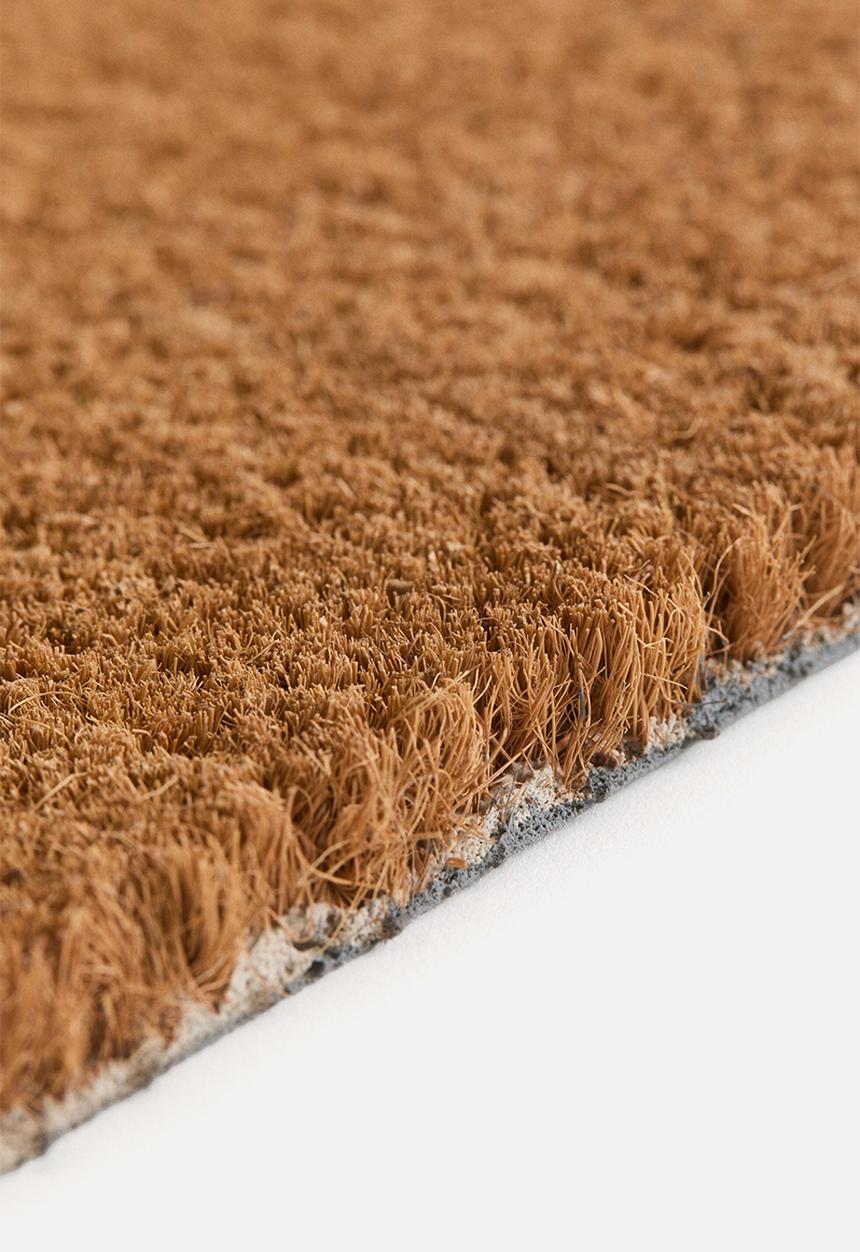 H&M - Printed coir doormat - brown/happy holidays