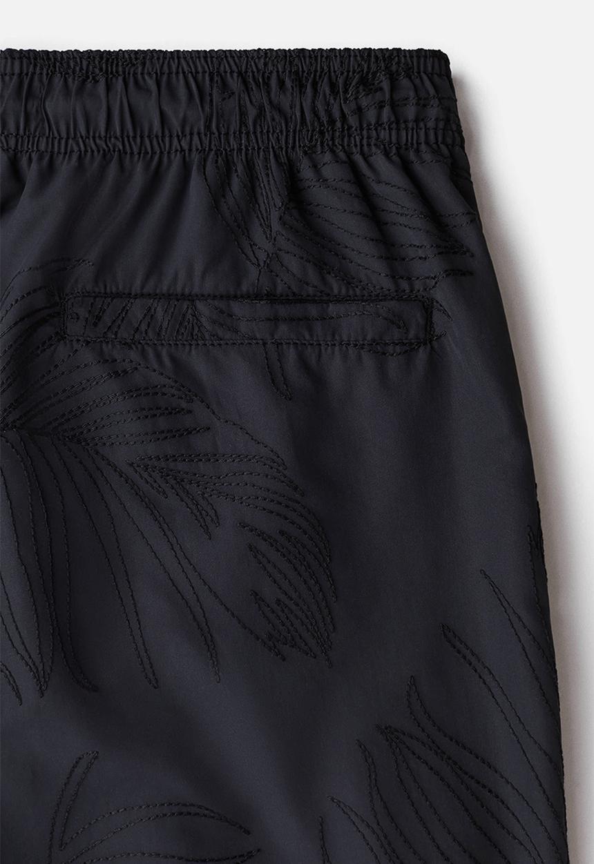 H&M - Patterned swim shorts - black leaf-patterned