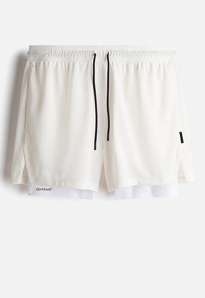 H&M - Mid-length 2-in-1 sports shorts with drymove™ - cream