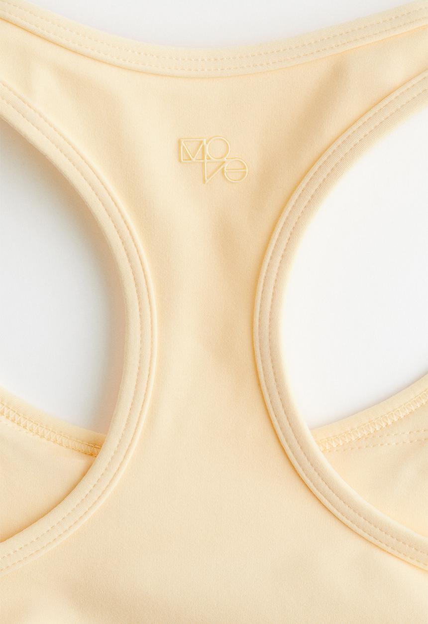 H&M - Medium support sports bra with softmove™ - light yellow