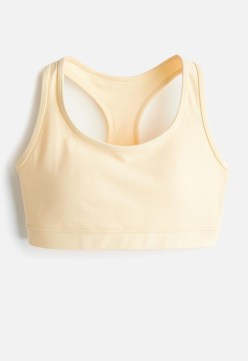 H&M - Medium support sports bra with softmove™ - light yellow