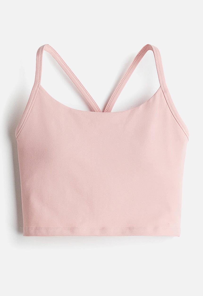 H&M - Medium support yoga bra with softmove™ - pink