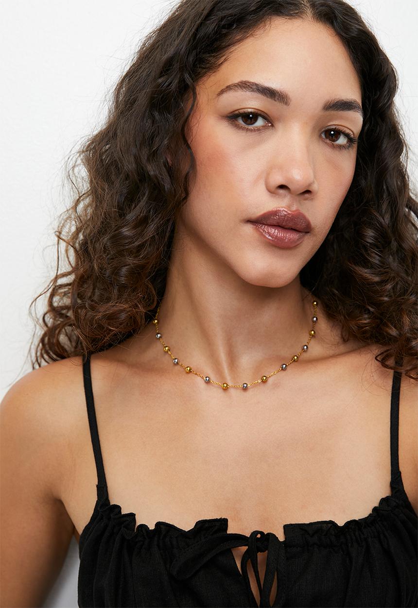 Zoe on Trend - Modern two tone bead necklace - gold