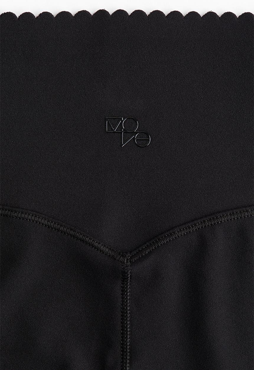 H&M - Flared sports leggings with softmove™ - black