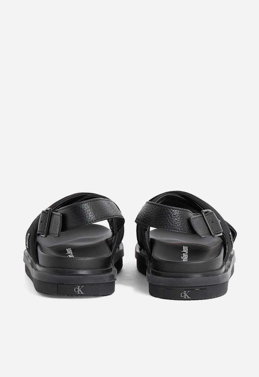 Calvin Klein - FLAT MOLDED CRXS SLING SANDAL CV - Triple Black