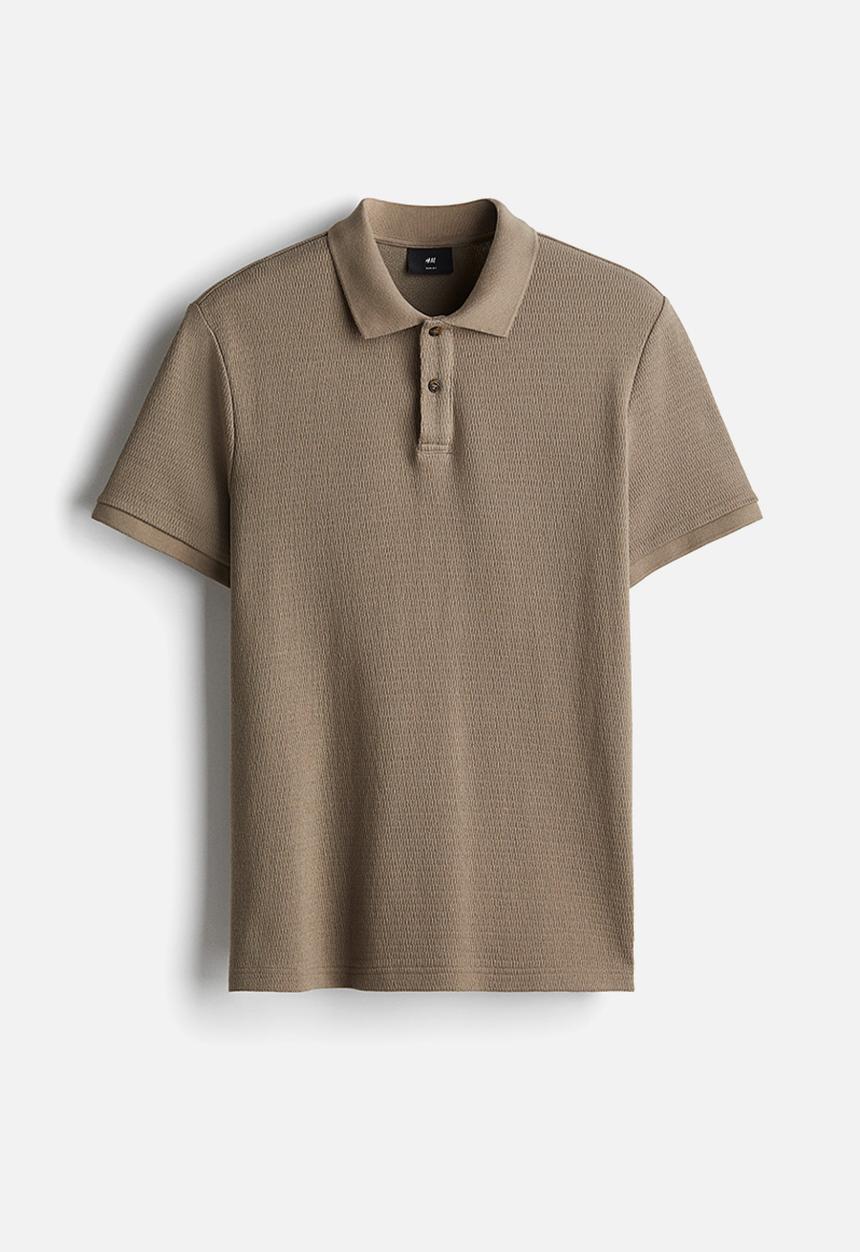 H&M - Slim fit polo shirt - dark beige 