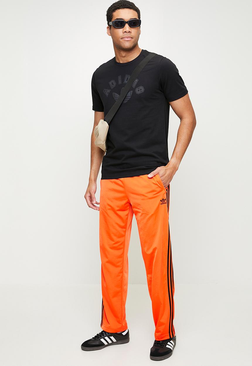 adidas Originals - Firebird Trackpant - Impact orange/black