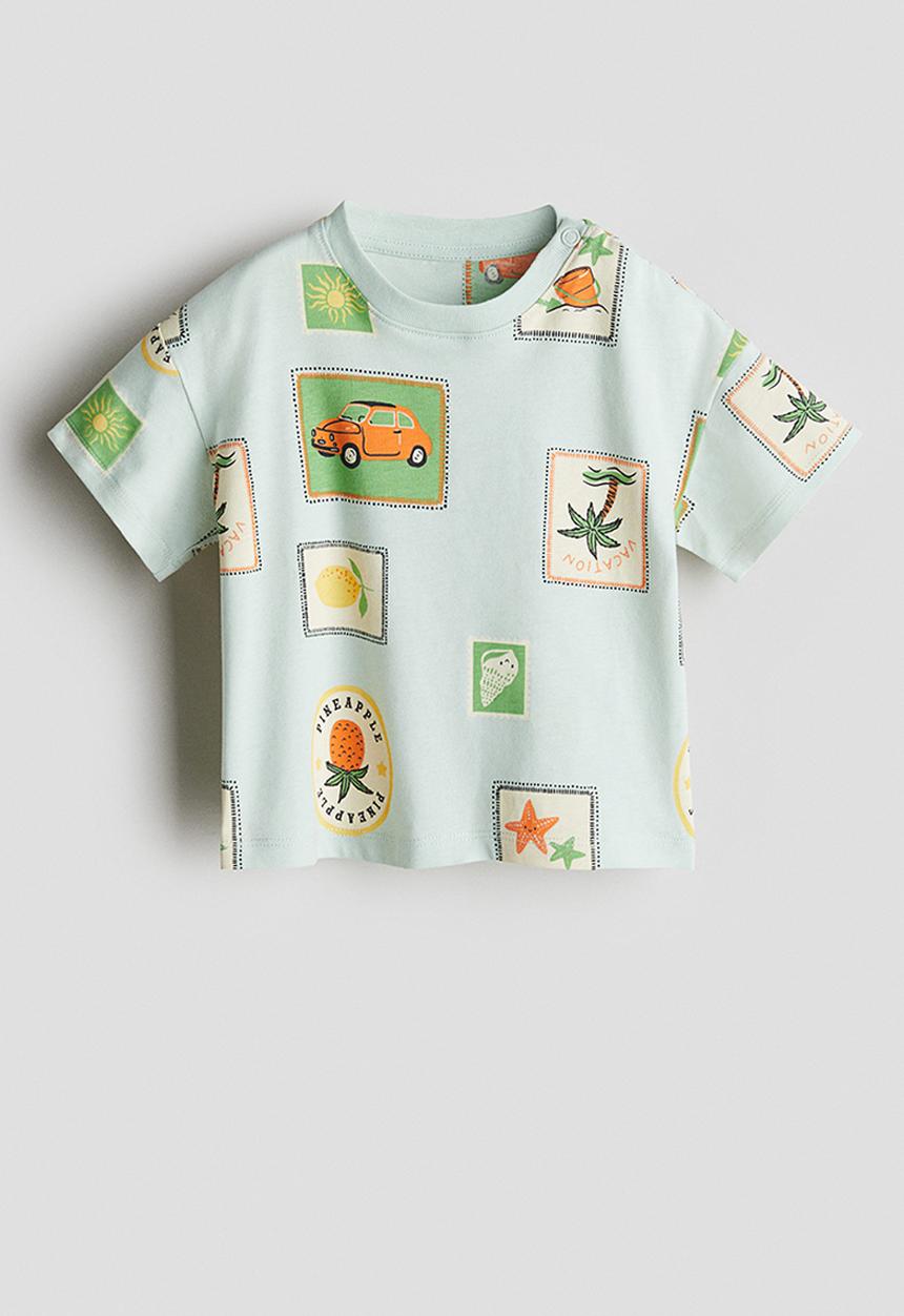 H&M - Printed cotton T-shirt - light turquoise/stamps