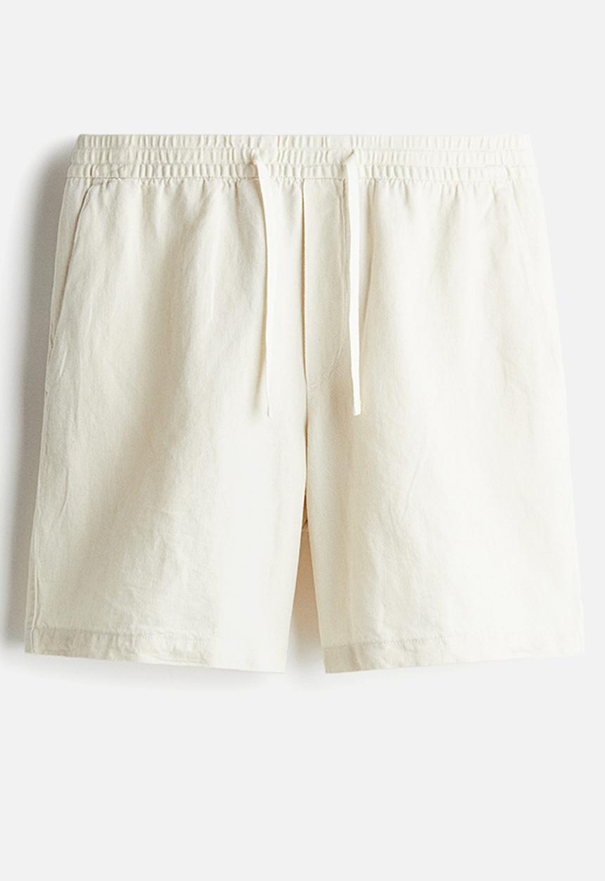 H&M - Relaxed fit linen-blend shorts - cream 
