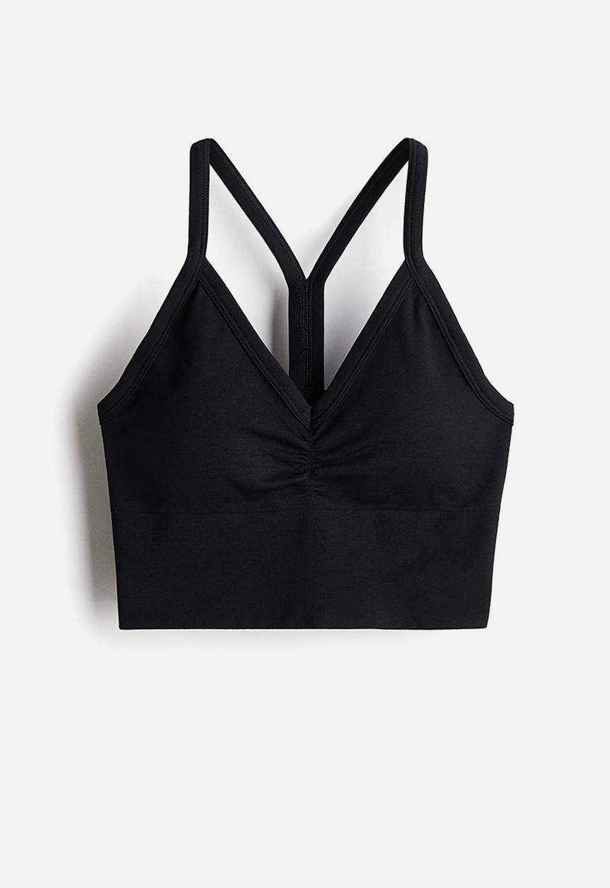 H&M - Seamless medium support sports bra with drymove™ - black