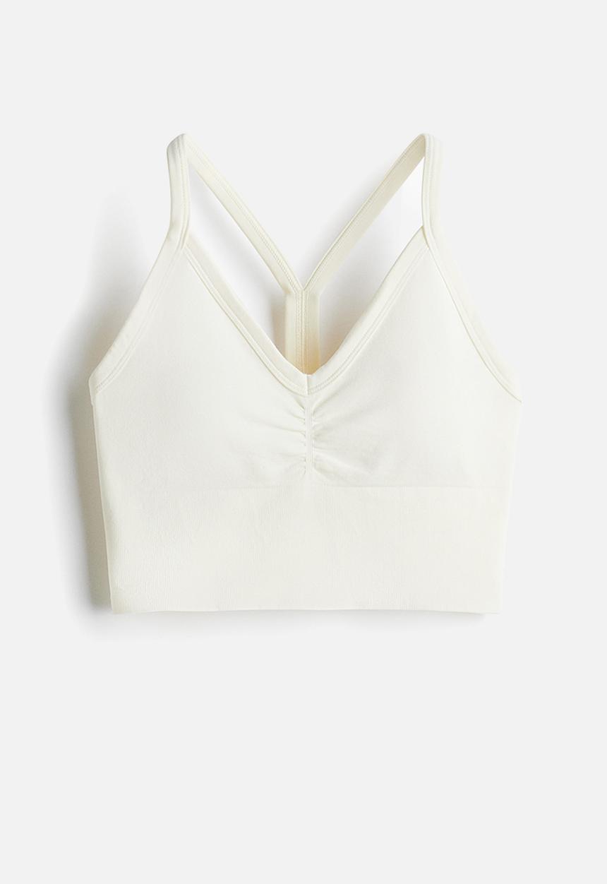 H&M - Seamless medium support sports bra with drymove™ - white