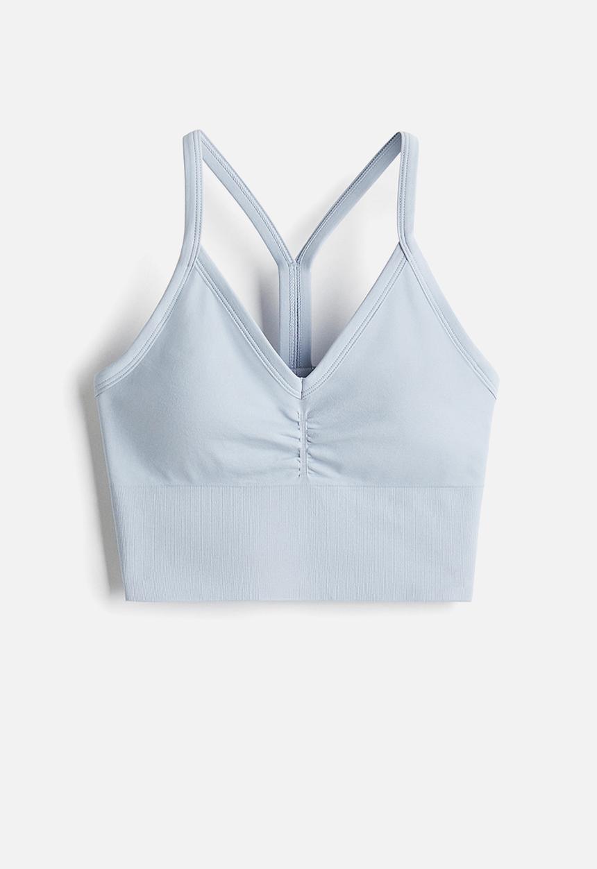 H&M - Seamless medium support sports bra with drymove™ - light blue
