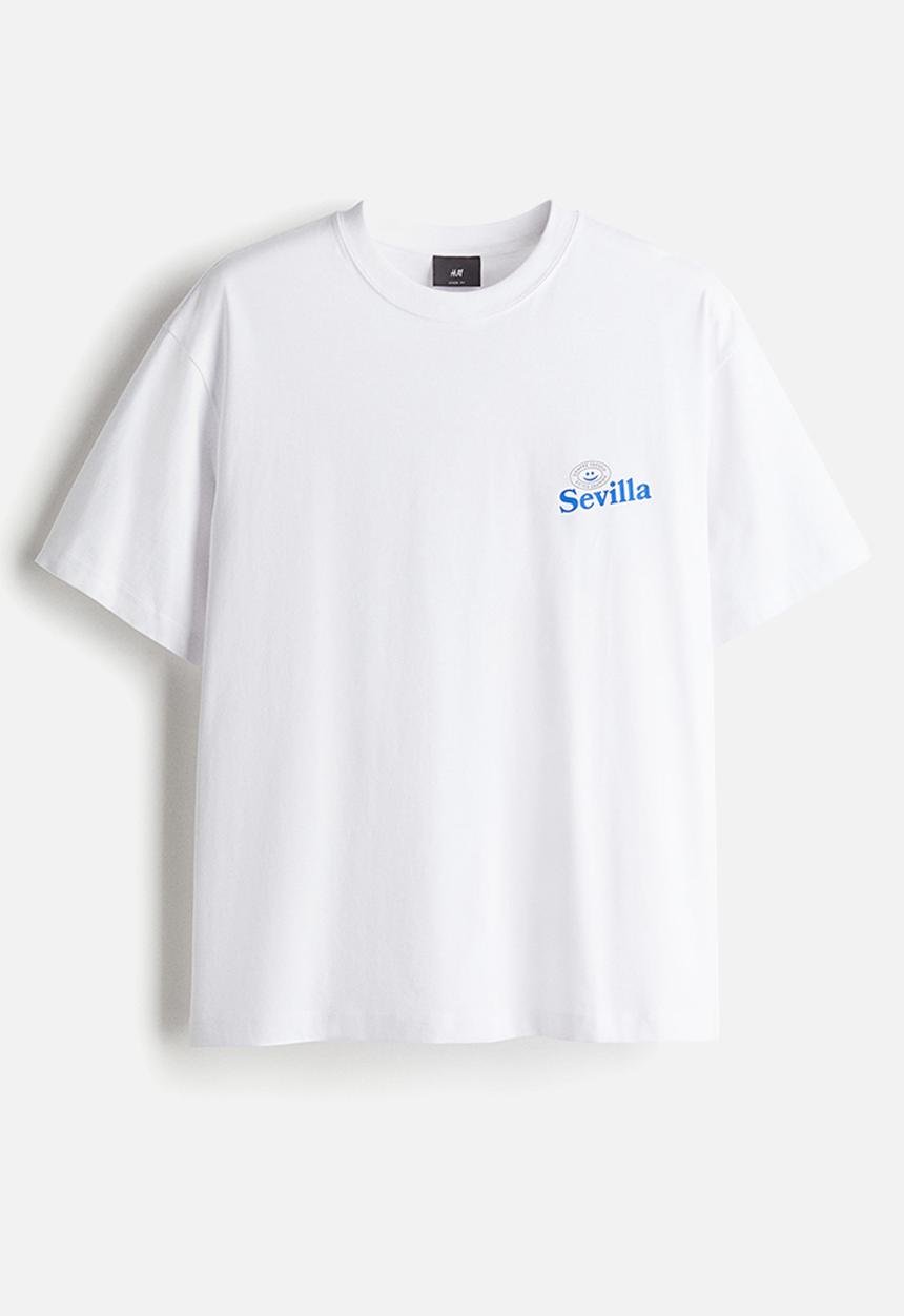 H&M - Loose fit printed T-shirt - white/sevilla