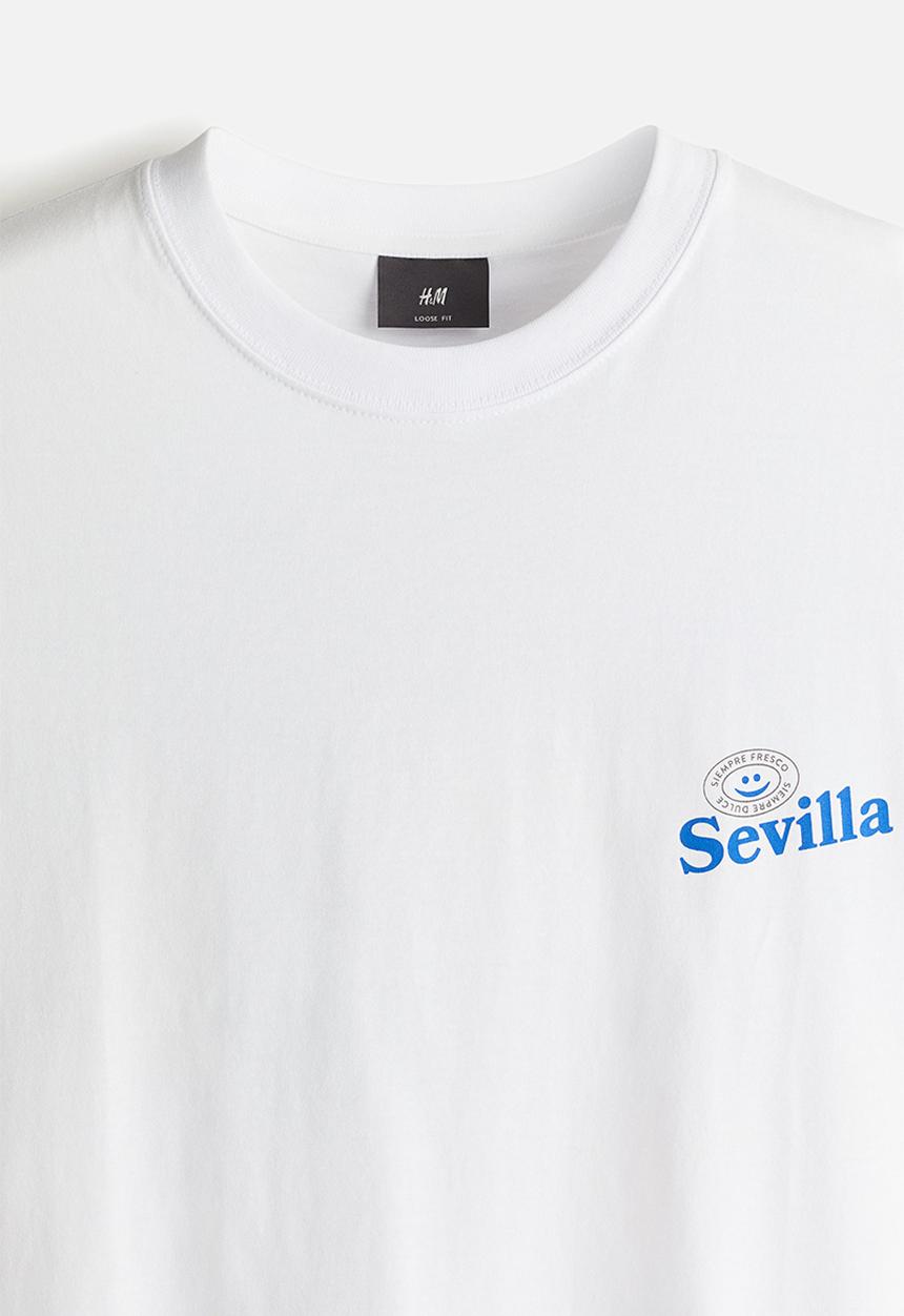 H&M - Loose fit printed T-shirt - white/sevilla