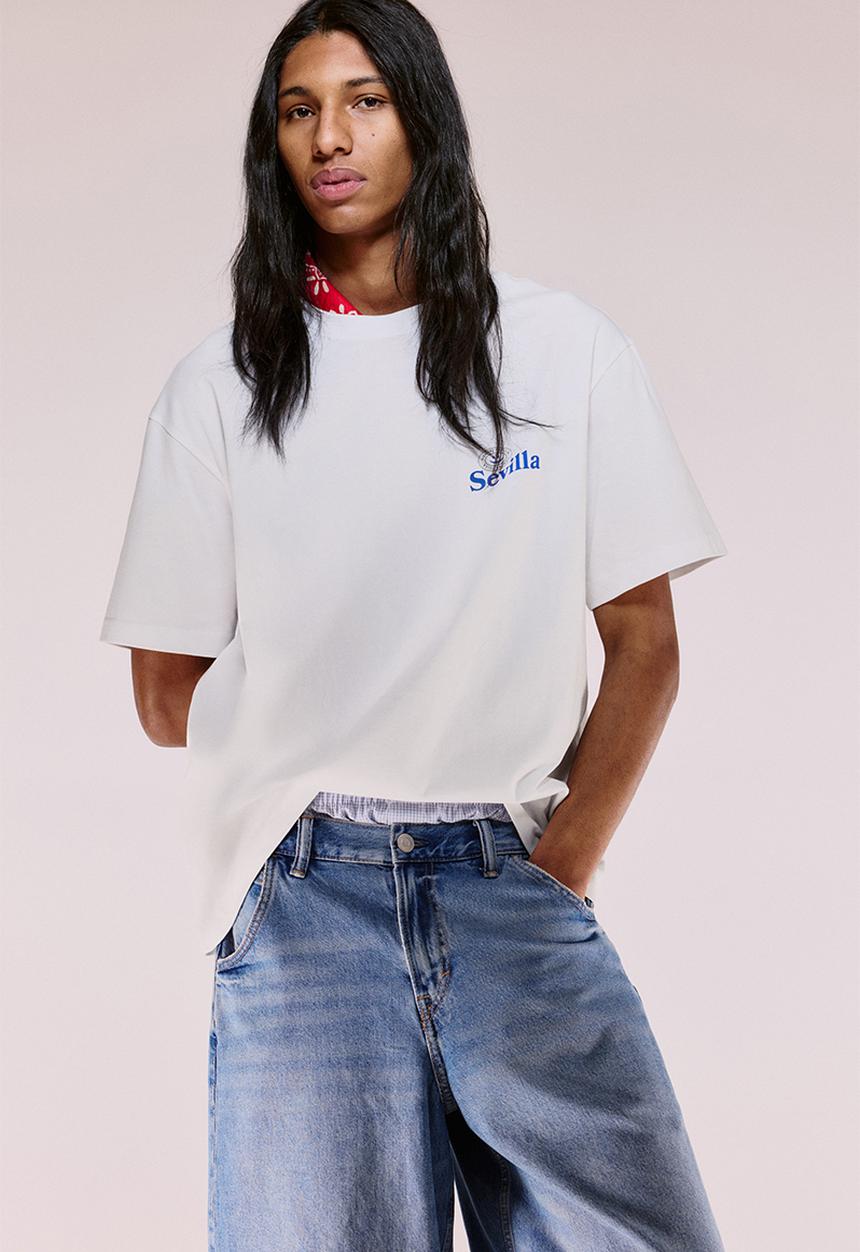 H&M - Loose fit printed T-shirt - white/sevilla