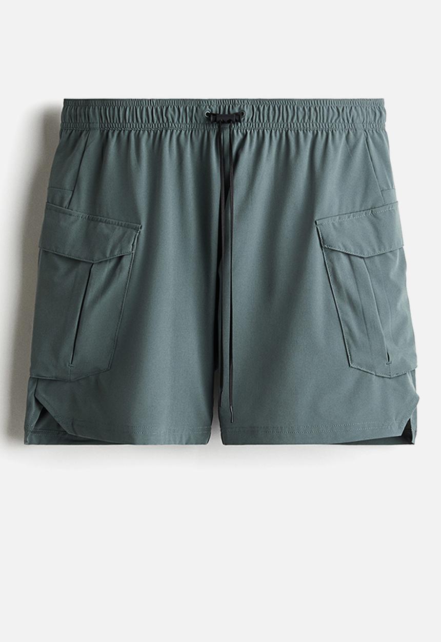 H&M - Mid-length cargo sports shorts with drymove™ - sage green