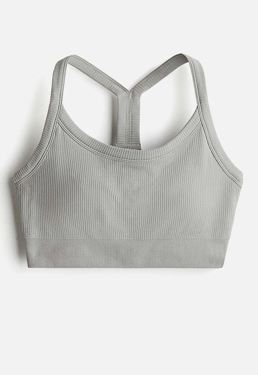 H&M - Seamless medium support sports bra with drymove™ - beige