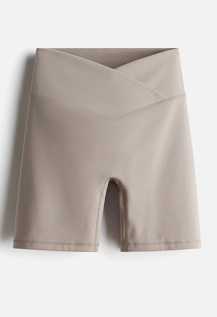 H&M - Sports cycling shorts with softmove™ - beige