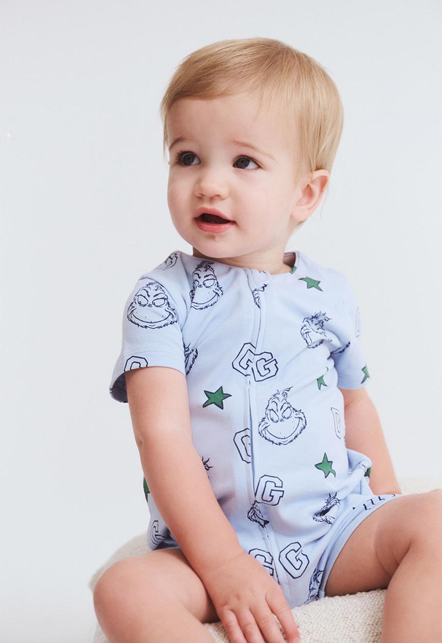 Cotton On - The short sleeve zip romper license - lcn drs dawn blue/grinch stars