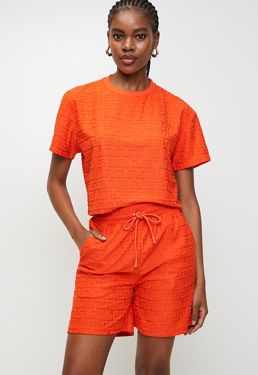 Steve Madden - Ladies bella embossed logo jogger shorts - tangerine
