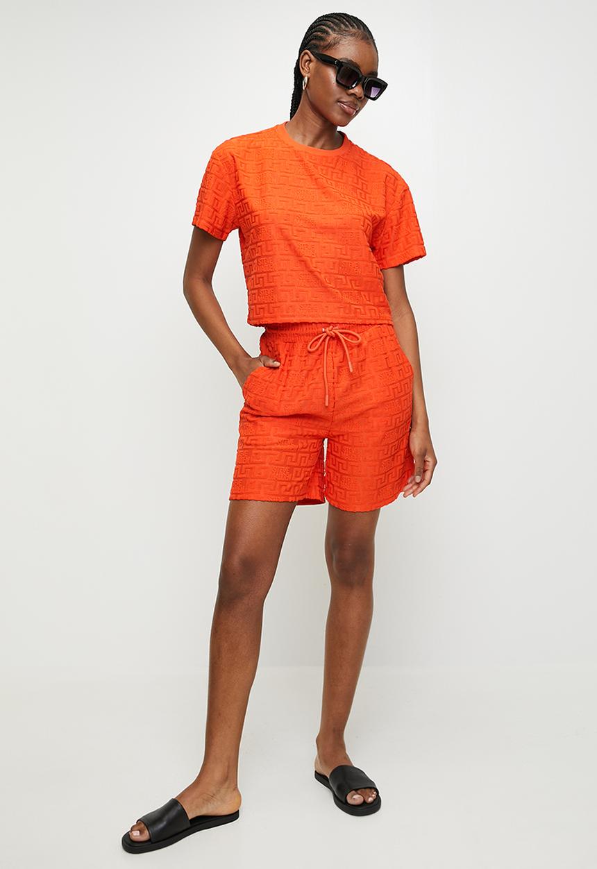 Steve Madden - Ladies ayaan embossed logo top - tangerine