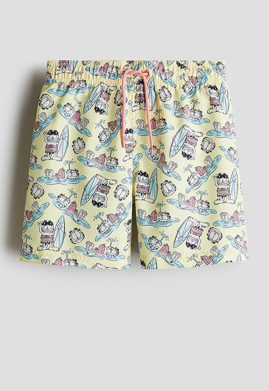 H&M - Printed swim shorts - light yellow/garfield